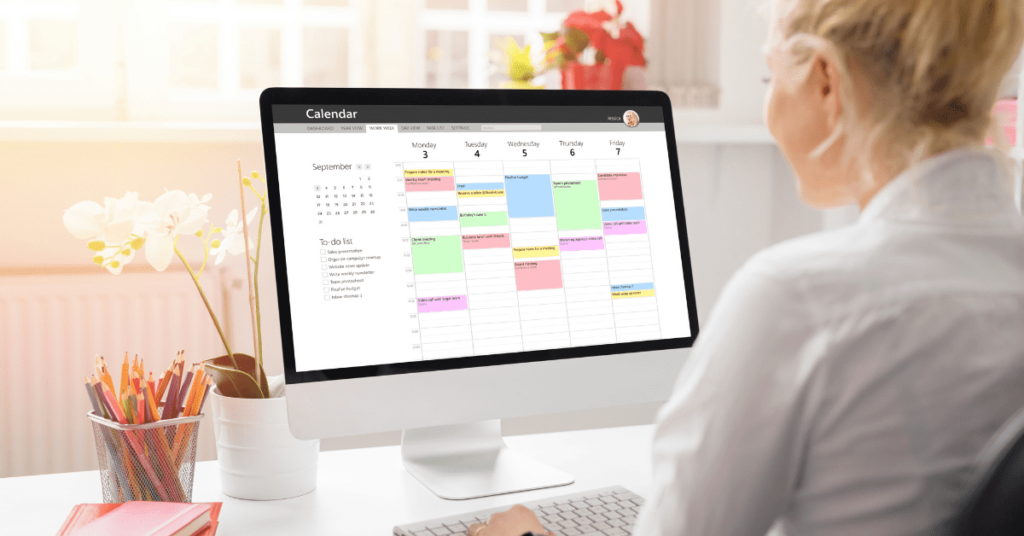 Woman checking a holiday calendar on a computer - Travel Industry Solutions